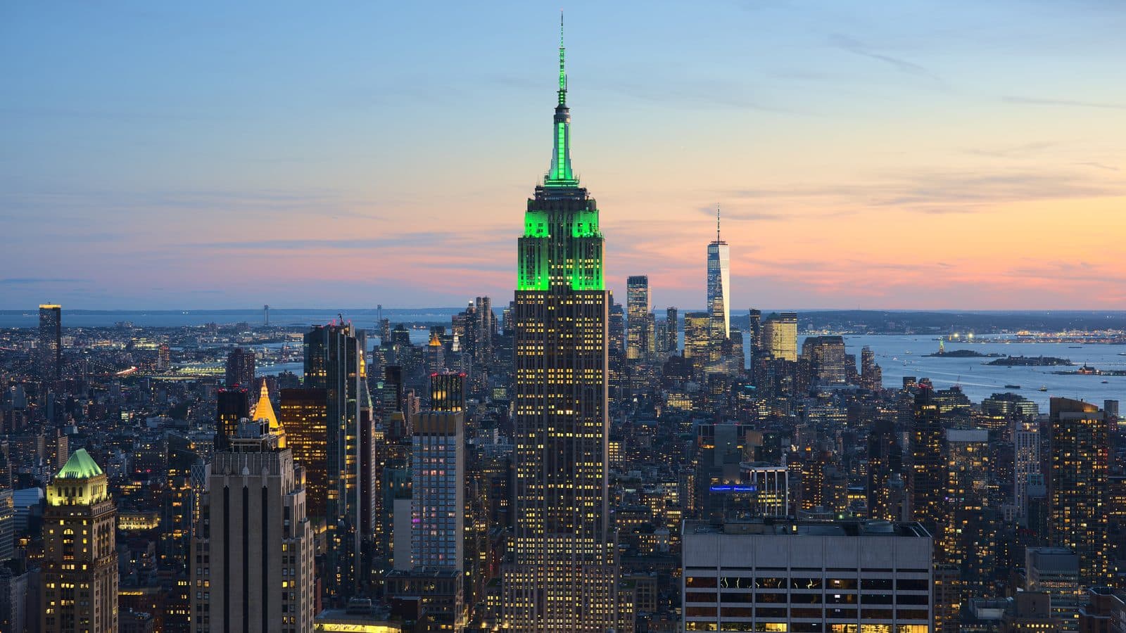 The Empire State Building above the Manhattan skyline at dusk